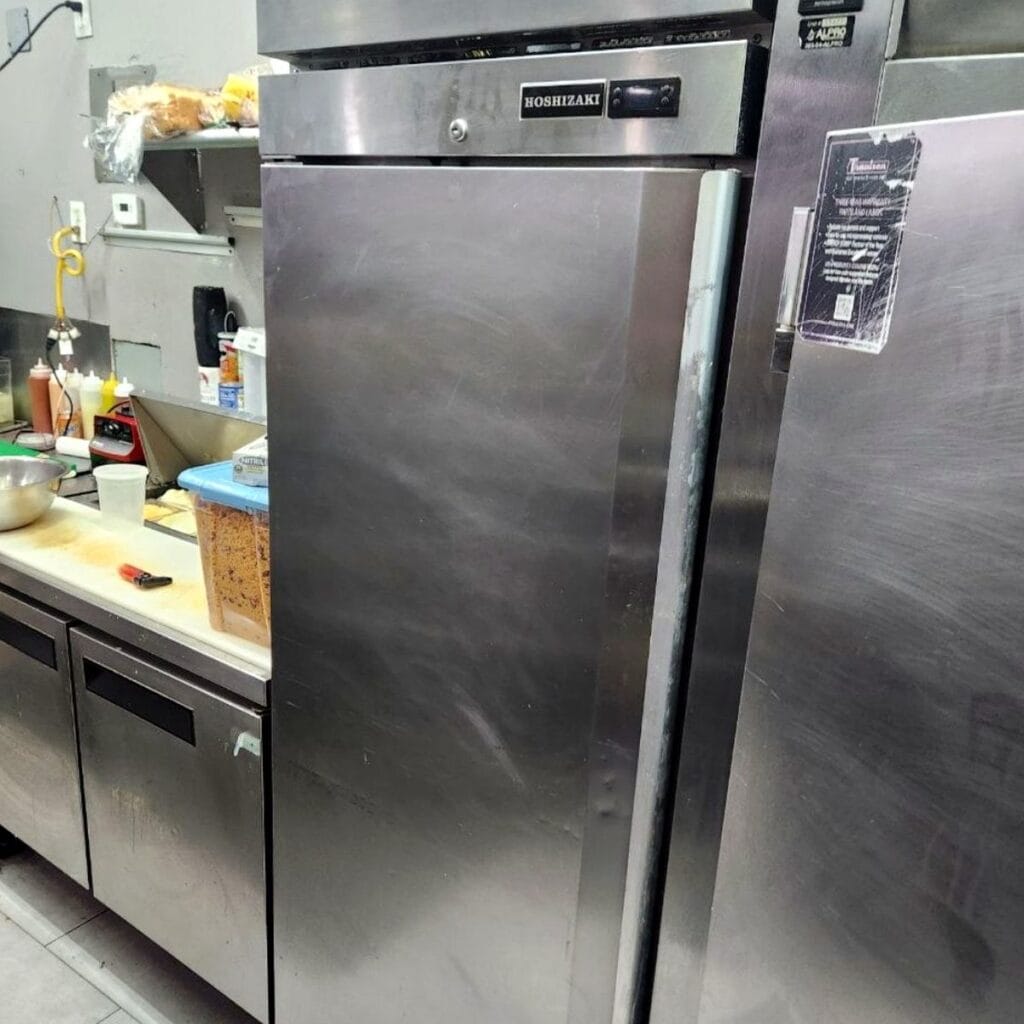 Commercial reach-in refrigerator in a restaurant kitchen